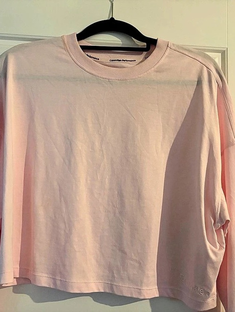 Calvin Klein Performance Cropped Long Sleeve Top in Pink Size M and one in Black